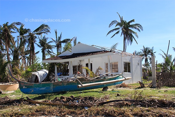 A cement house that lost its roof to Typhoon Haiyan