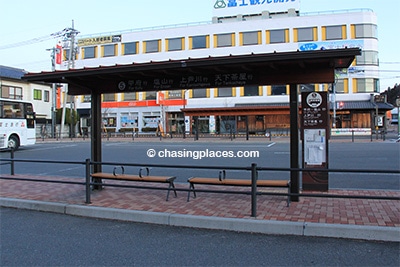 Bus platform #5 in front of Kawaguchiko Train Station . The bus goes from here to Kofu Station