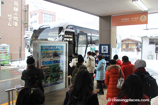 Boarding the tour bus at Takayama Station