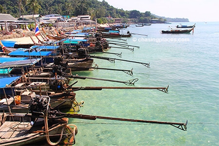There are plenty of longtail boats waiting for passengers to go to long beach from Ton Sai Beach