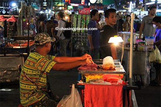 A local vendor on Khaosan Rd around 10 pm