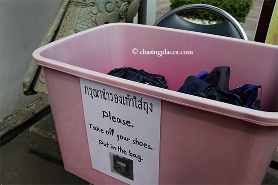 Simply place your shoes in the bag provided to carry your shoes at Wat Pho