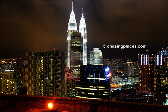 Try to find a view of the Petronas Towers from one of KlL's excellent skybars