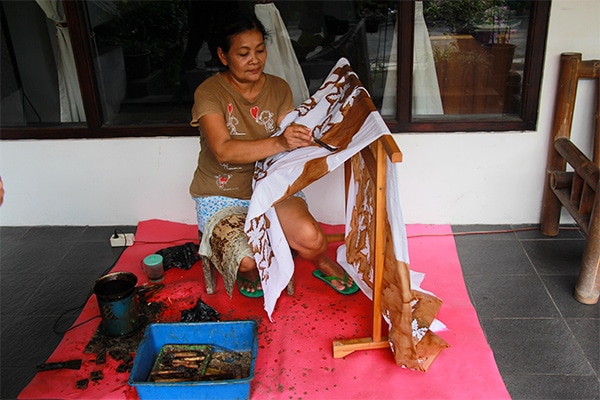 A local artisan in Yogyakarta painting batik