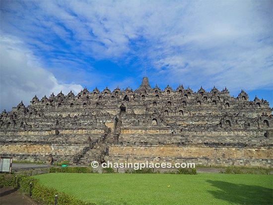 Unless you have a super wide angle camera lens good luck getting massive Borobudur in one shot.