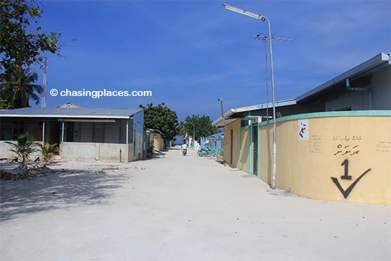 Curved cement walls surround many of the homes on Maafushi Island