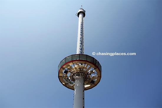 The rotating glass room ascending to the top of Menara Taming Sari