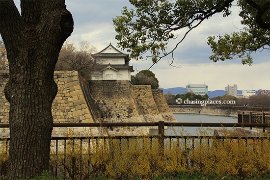 A glimpse of the moat surrounding Osaka jo,-Japan