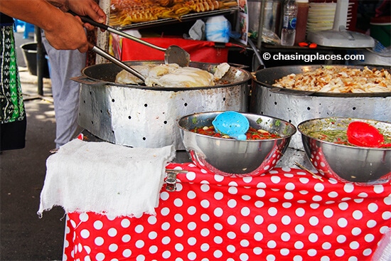 A spicy fish dish in the making at Chatuchak Market