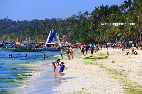 White Beach, Boracay with some green algae washed ashore.